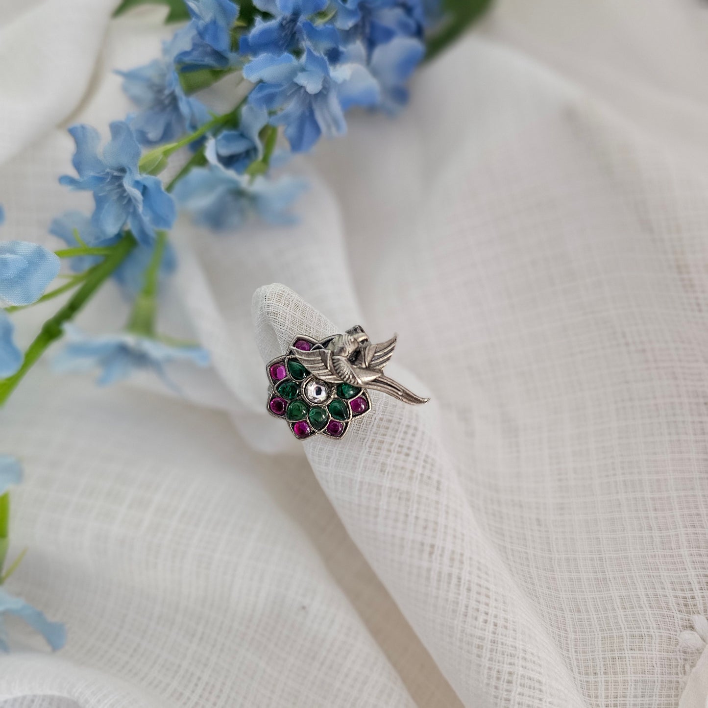 Silver 92.5 green, pink Kemp and moissanite ring