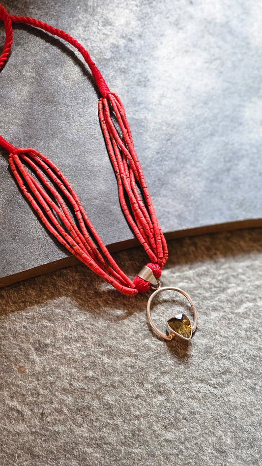 Red coral strings with yellow topaz
