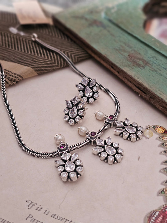 "Discover elegance with Shopvasuki’s 92.5 silver zircon necklace set. Handcrafted, versatile & timeless — perfect for everyday wear or special occasions."