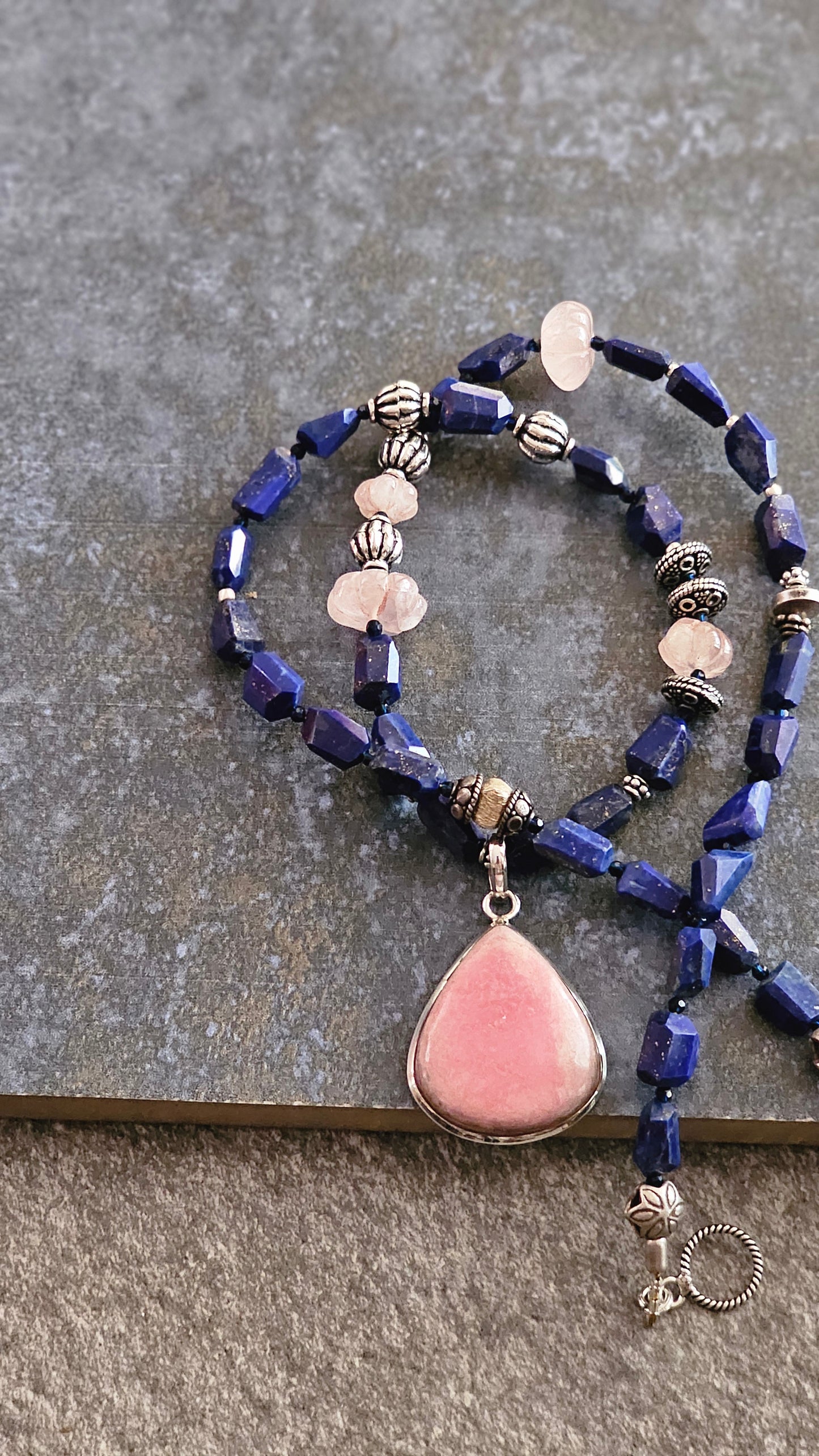 Rhodocrhrosite pendant with faceted Lapis Necklace