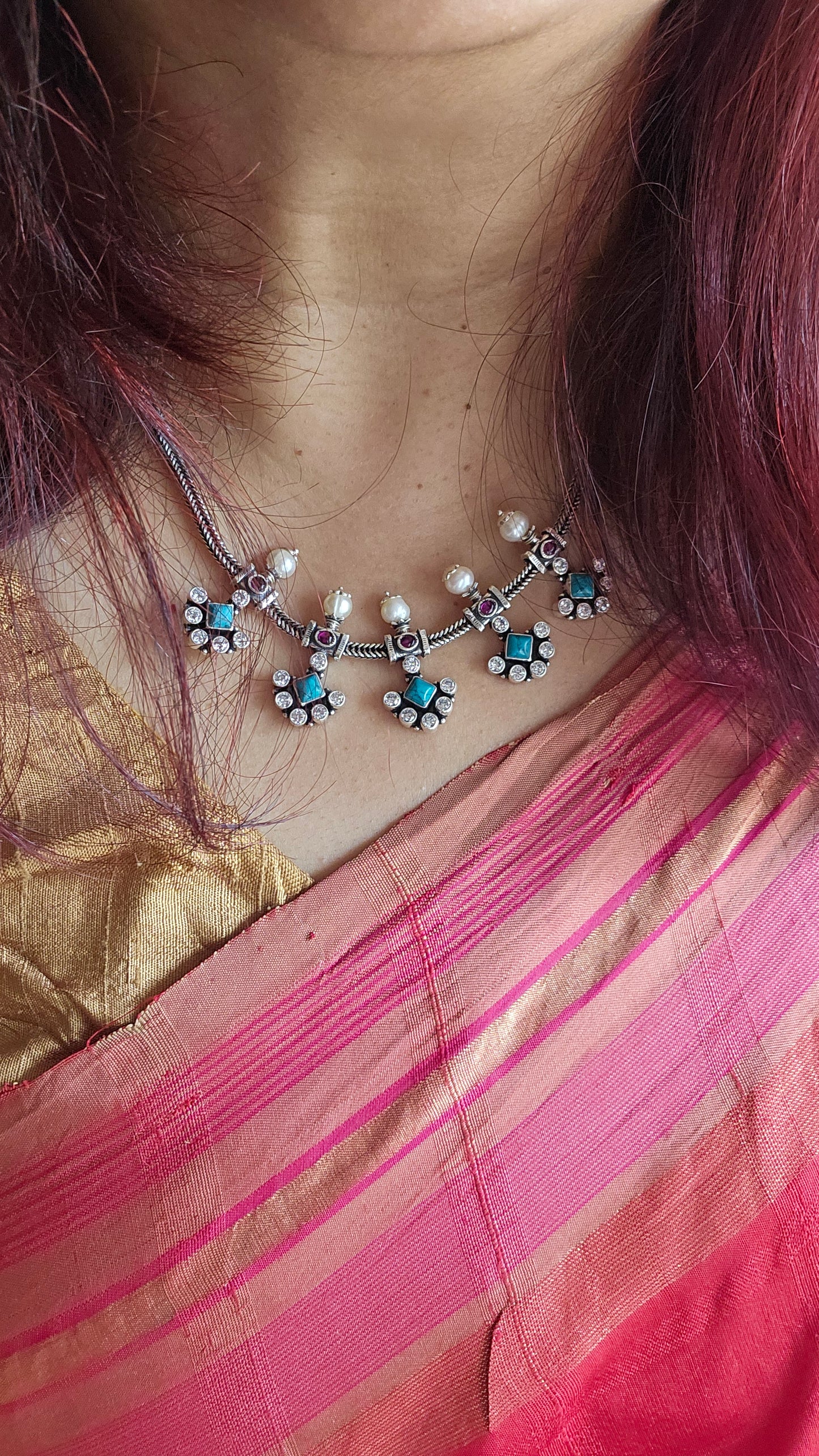 "Shop Vasuki’s 92.5 silver turquoise & zircon necklace set – versatile, handcrafted elegance for everyday wear, festive looks & timeless gifting."