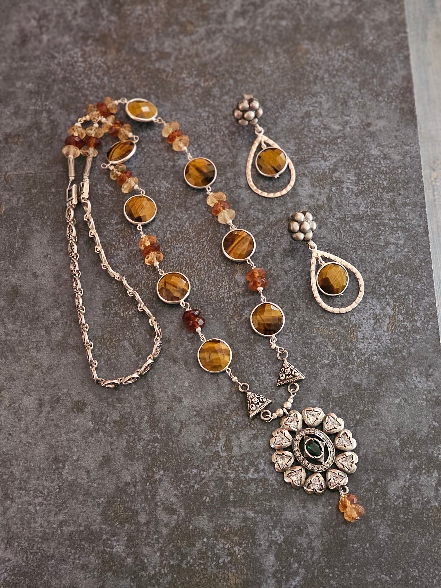 Tiger eye strung with hessonite stones strung on silver wires with Victorian setting moissanite pendant