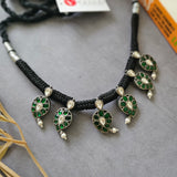 Silver green kundan paisley on black threadwork