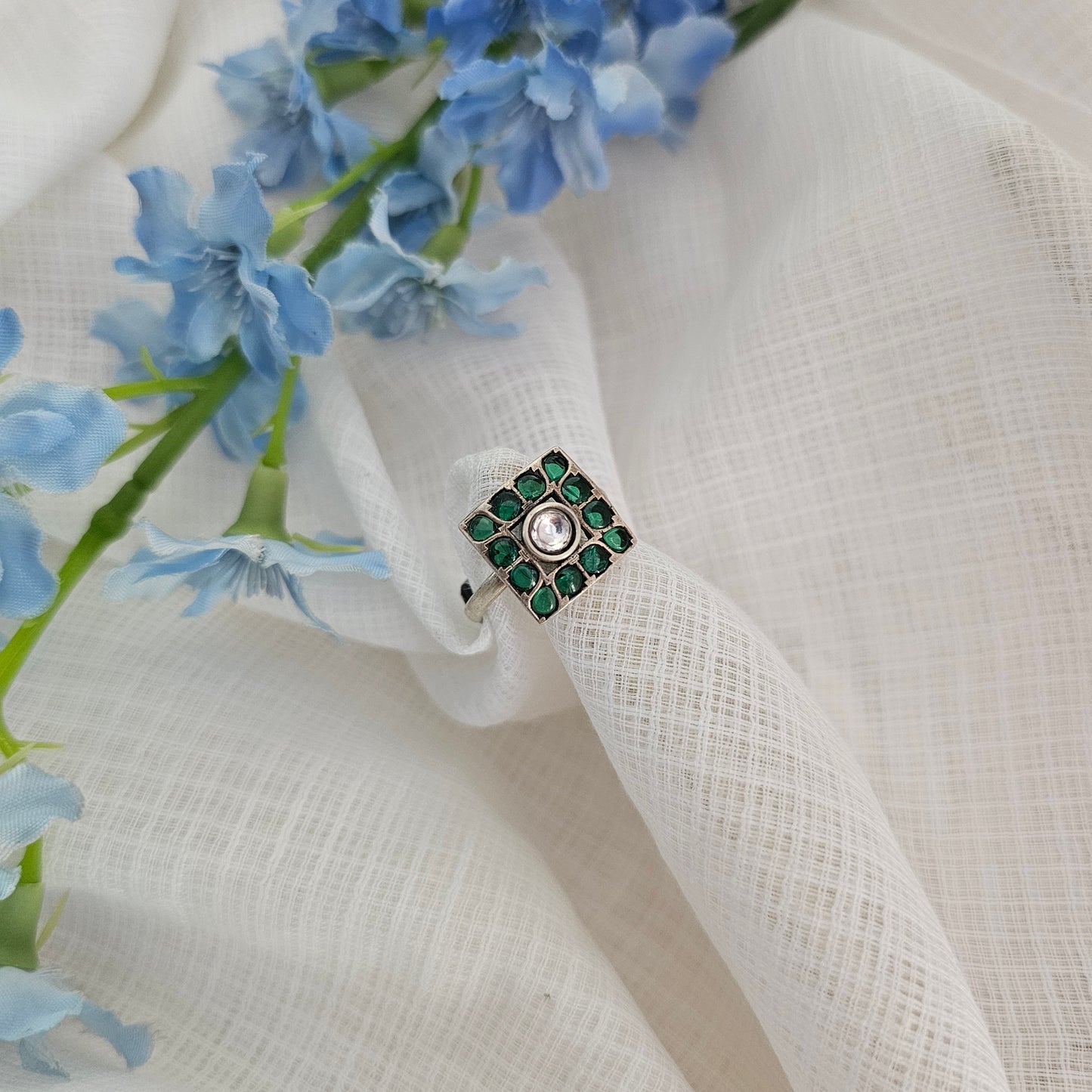 Silver 92.5 green kemp and moissanite ring