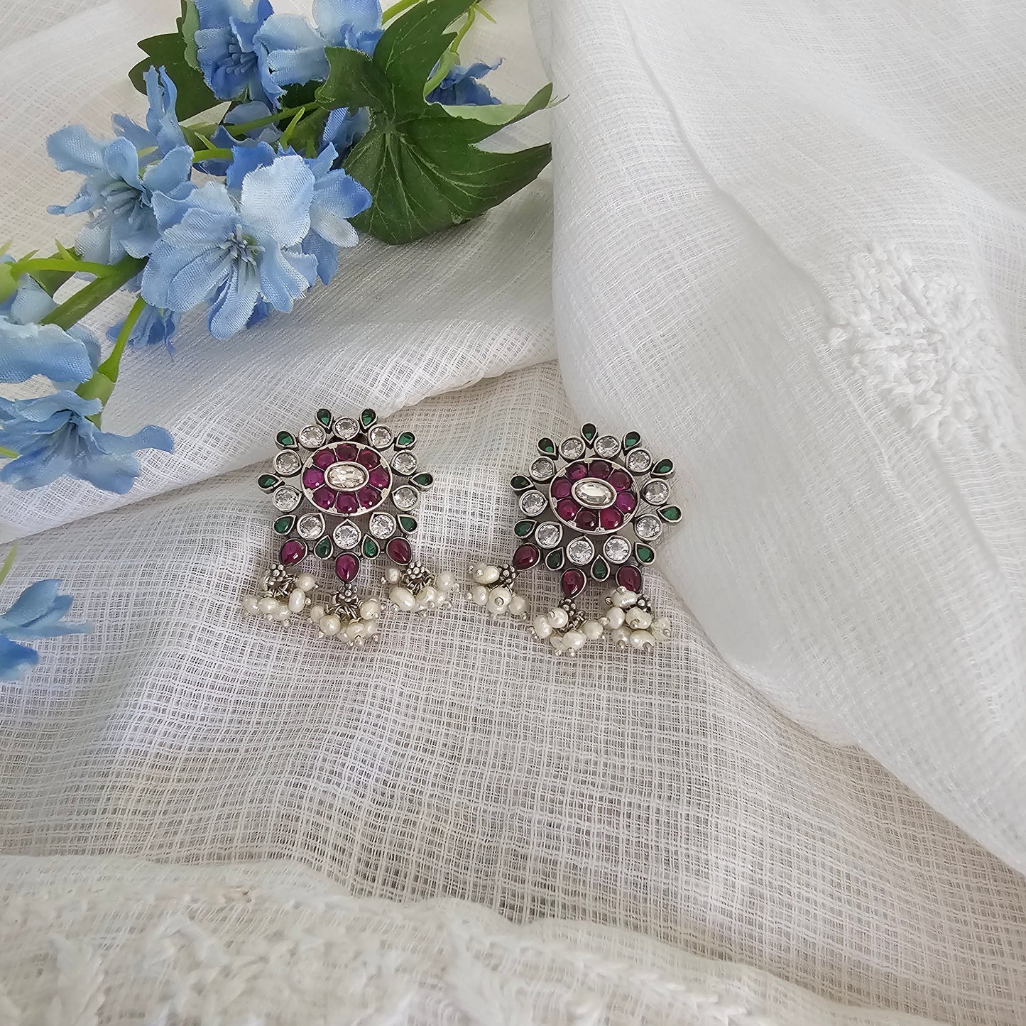 Silver 92.5 moissanite and Kemp stud