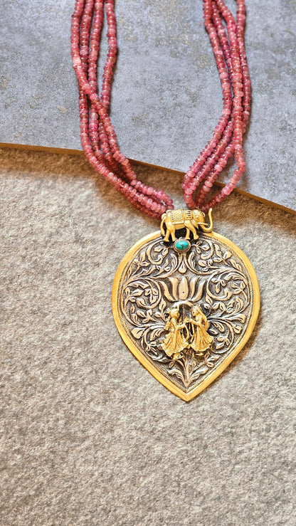 Real tourmaline necklace with repousse pendant