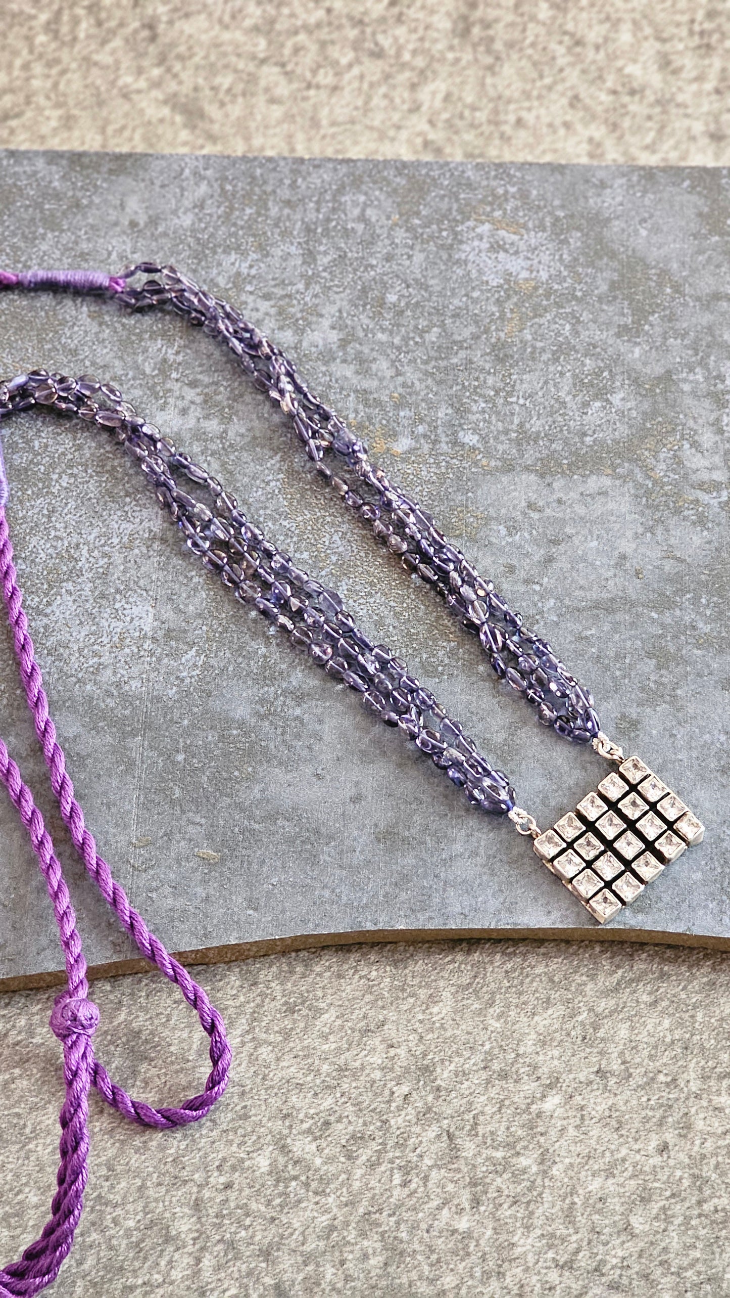 Iolite strings with a beautiful AD pendant