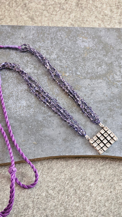 Iolite strings with a beautiful AD pendant