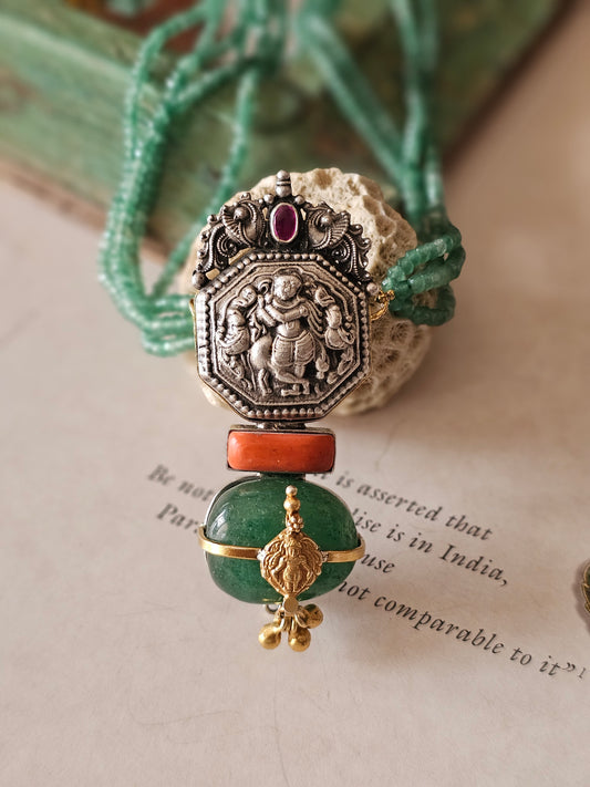 Vintage silver nakas pendant with emerald tumble and strings