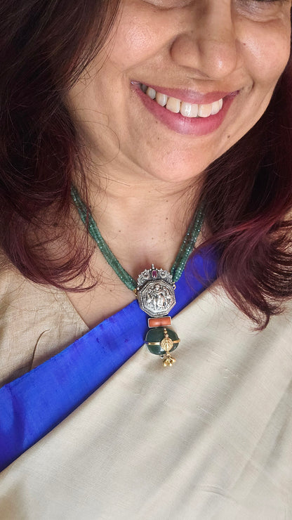 Vintage silver nakas pendant with emerald tumble and strings