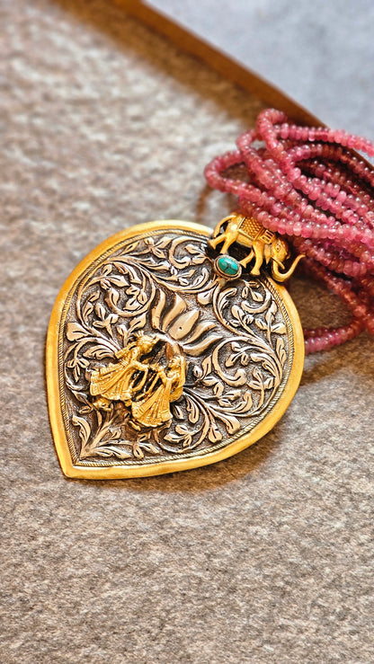 Real tourmaline necklace with repousse pendant