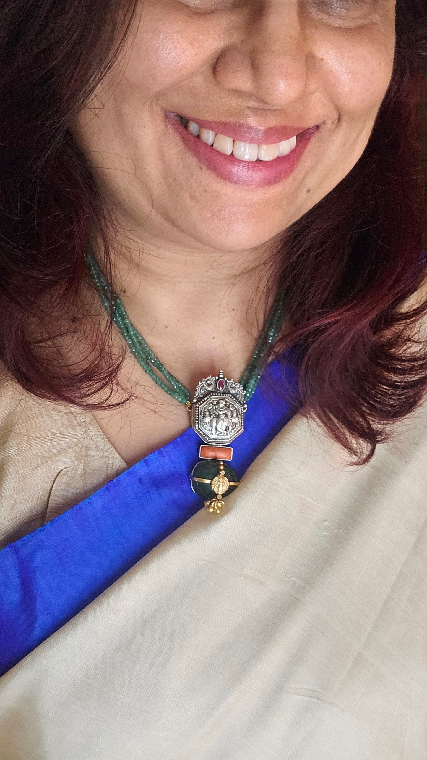 Vintage silver nakas pendant with emerald tumble and strings