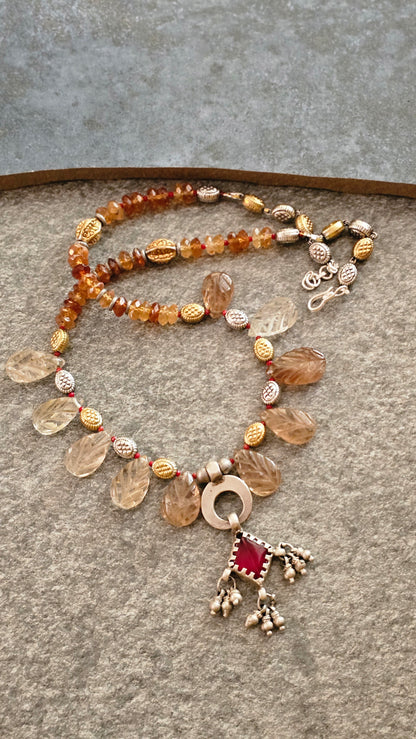 Carved champagne topaz necklace with vintage glass pendant