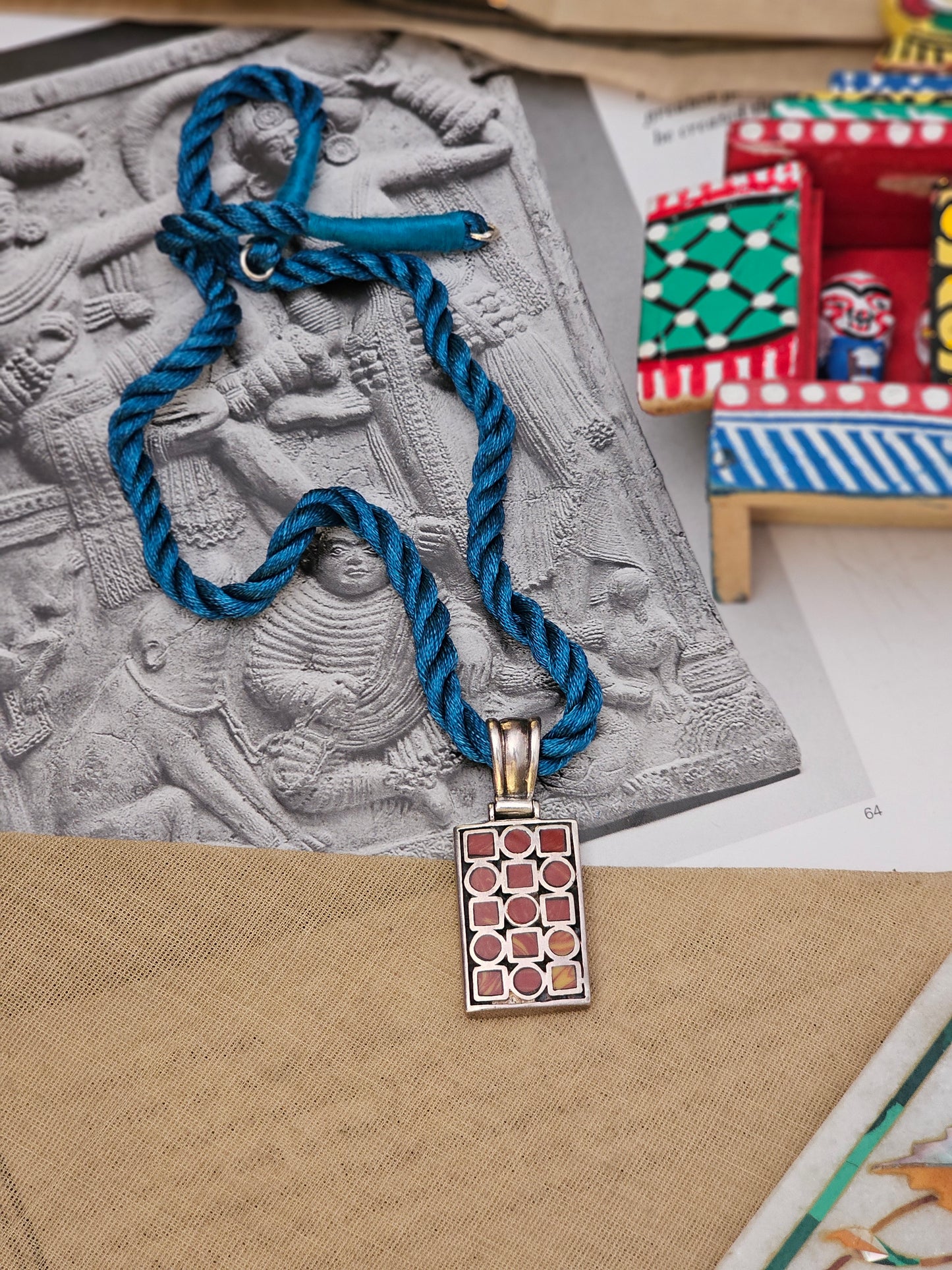 Compressed coral pendant