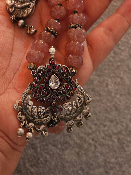 Kempu nakash-style peacock pendant with pink jade strawberry gemstones