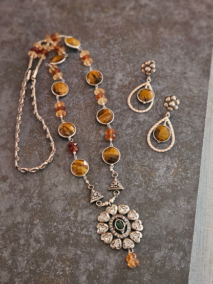 Tiger eye strung with hessonite stones strung on silver wires with Victorian setting moissanite pendant
