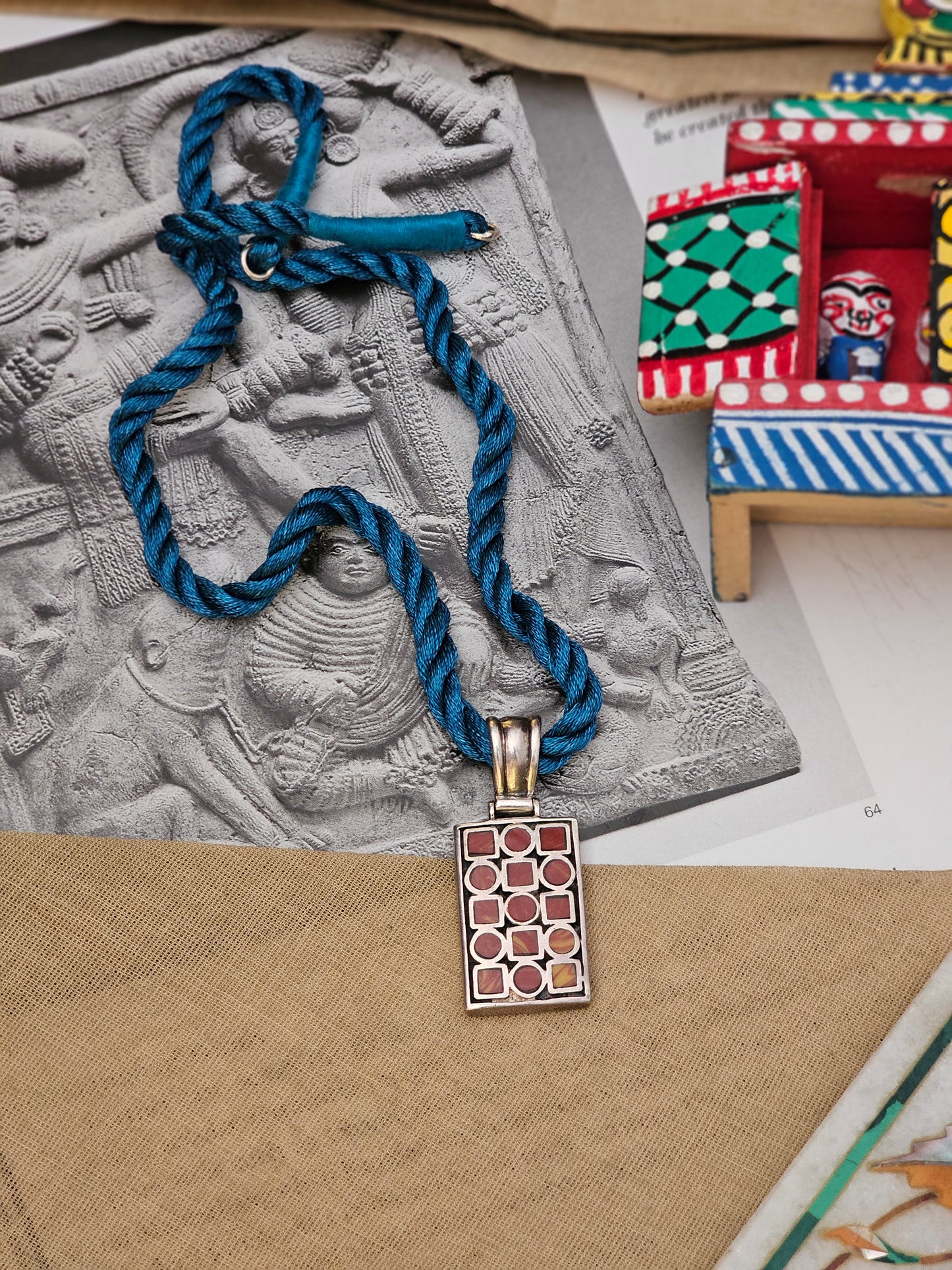 Compressed coral pendant