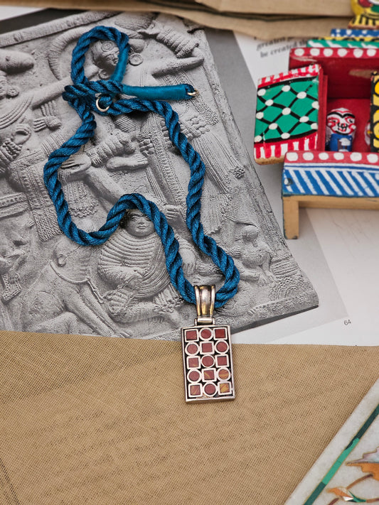 Compressed coral pendant