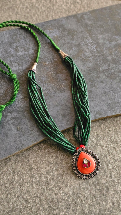Malachite strings necklace with coral kundan pendant
