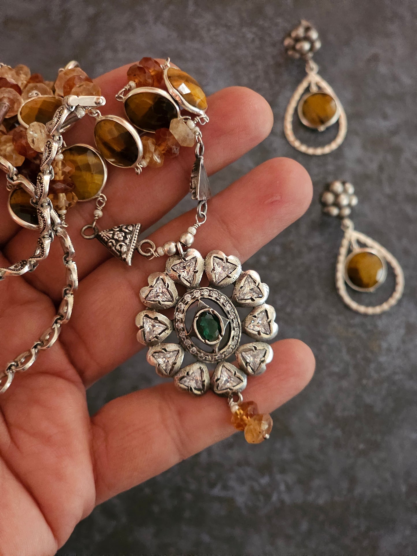 Tiger eye strung with hessonite stones strung on silver wires with Victorian setting moissanite pendant