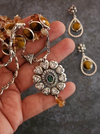 Tiger eye strung with hessonite stones strung on silver wires with Victorian setting moissanite pendant