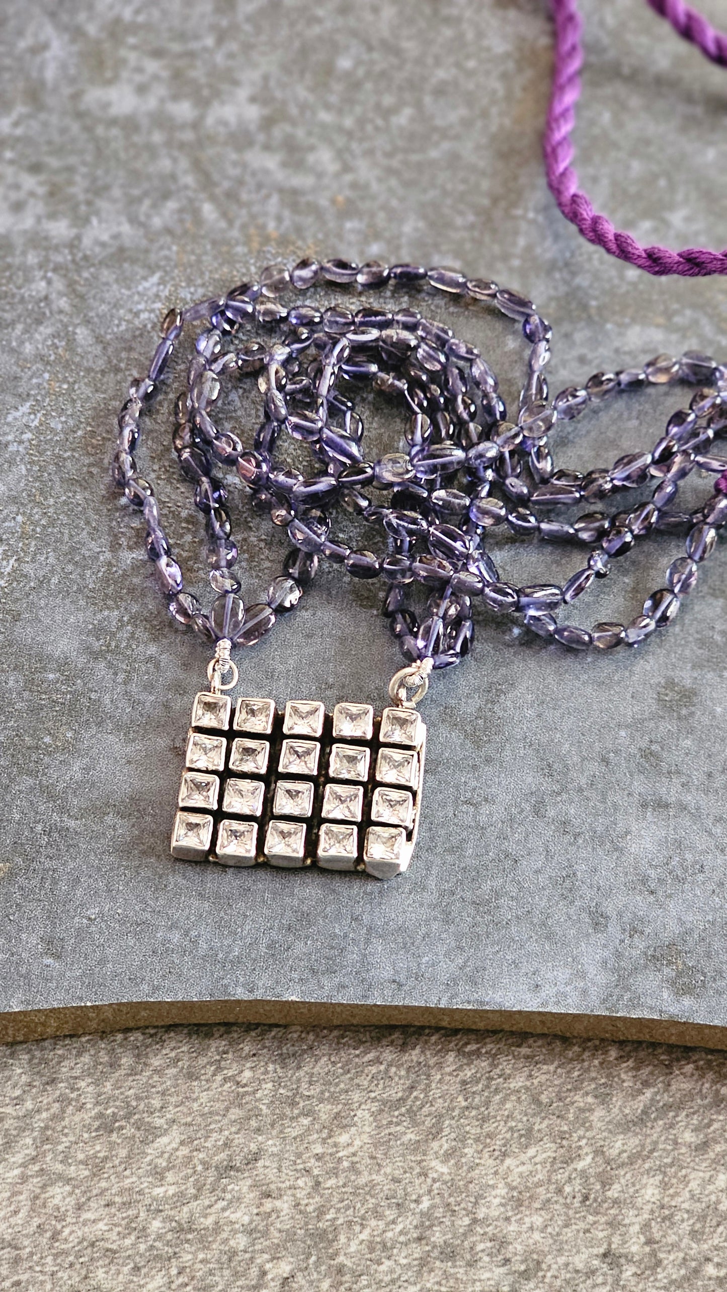 Iolite strings with a beautiful AD pendant