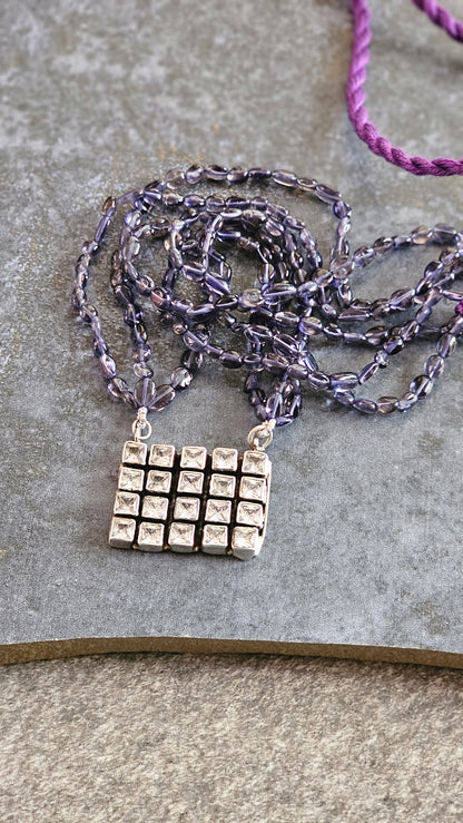 Iolite strings with a beautiful AD pendant
