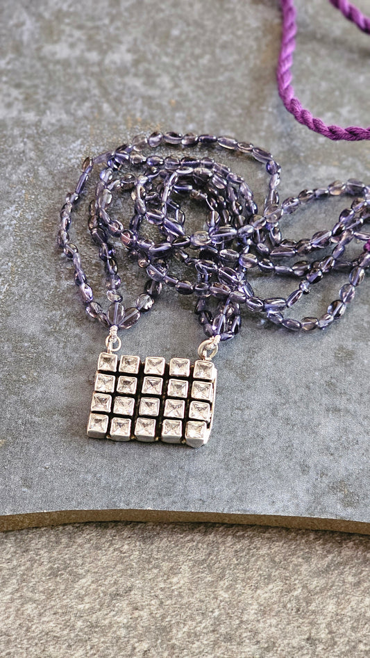 Iolite strings with a beautiful AD pendant
