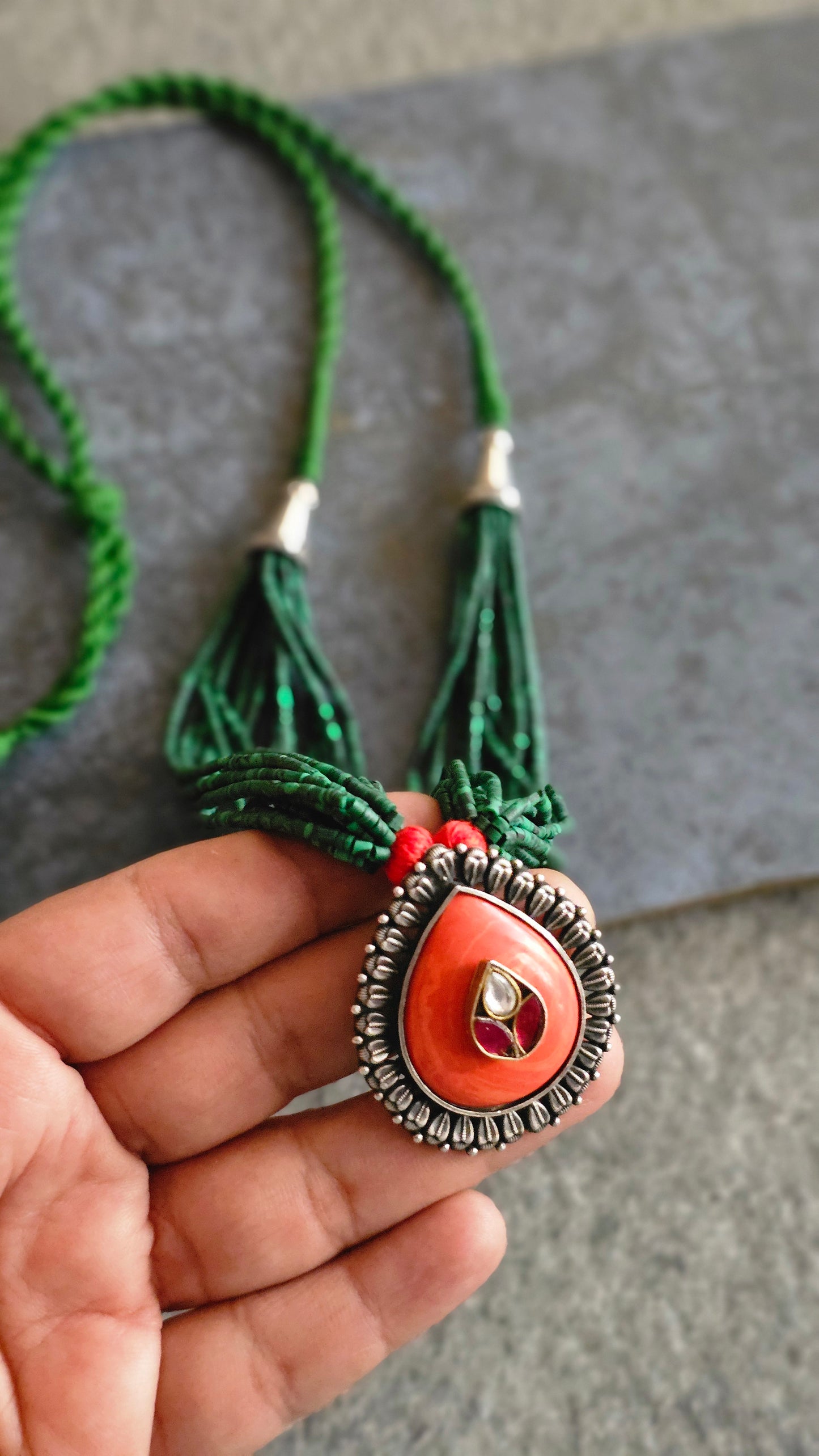 Malachite strings necklace with coral kundan pendant