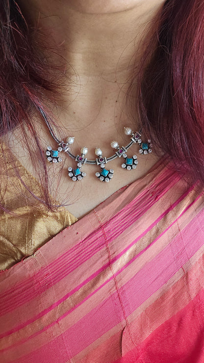 "Shop Vasuki’s 92.5 silver turquoise & zircon necklace set – versatile, handcrafted elegance for everyday wear, festive looks & timeless gifting."