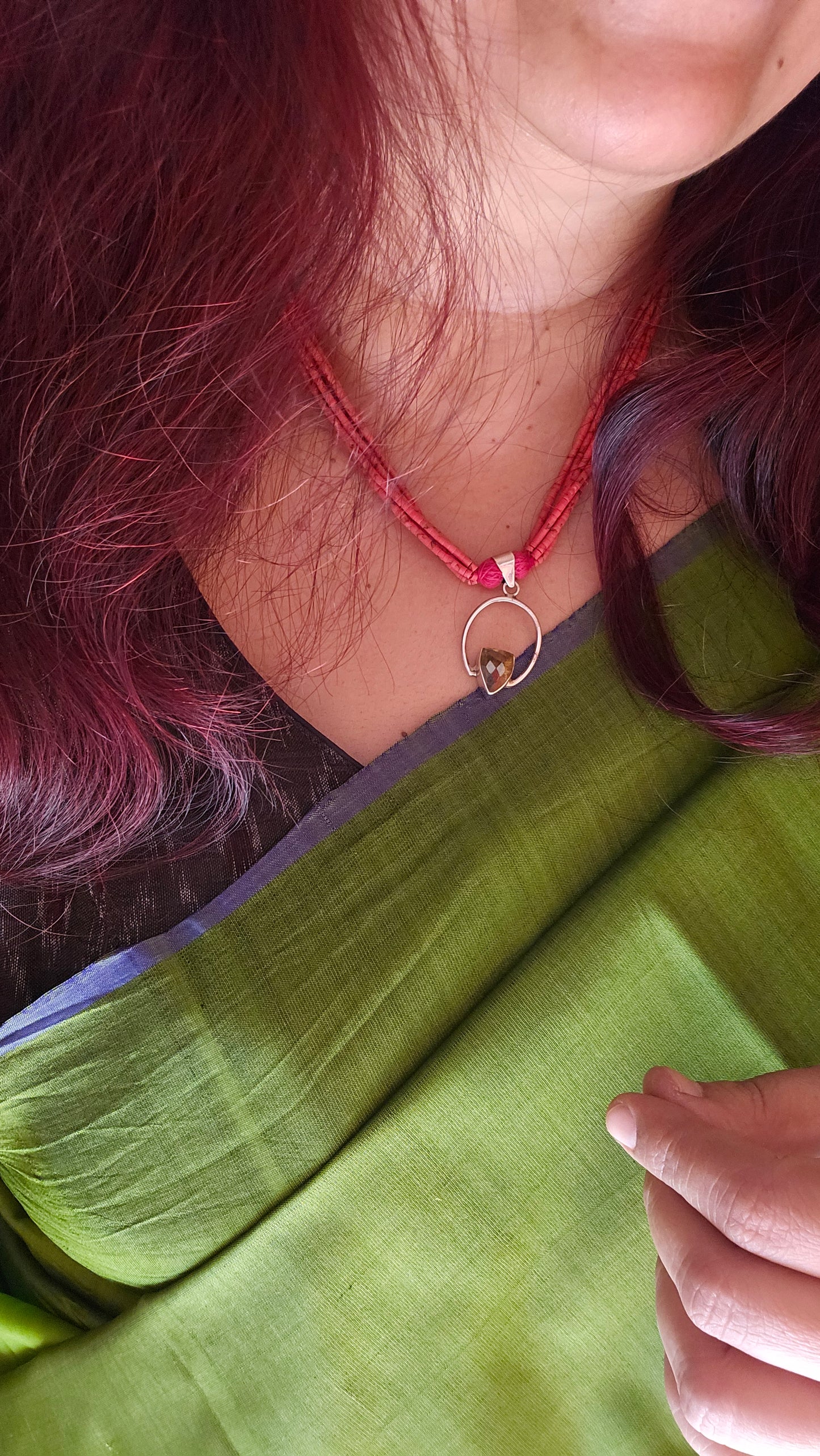 Red coral strings with yellow topaz