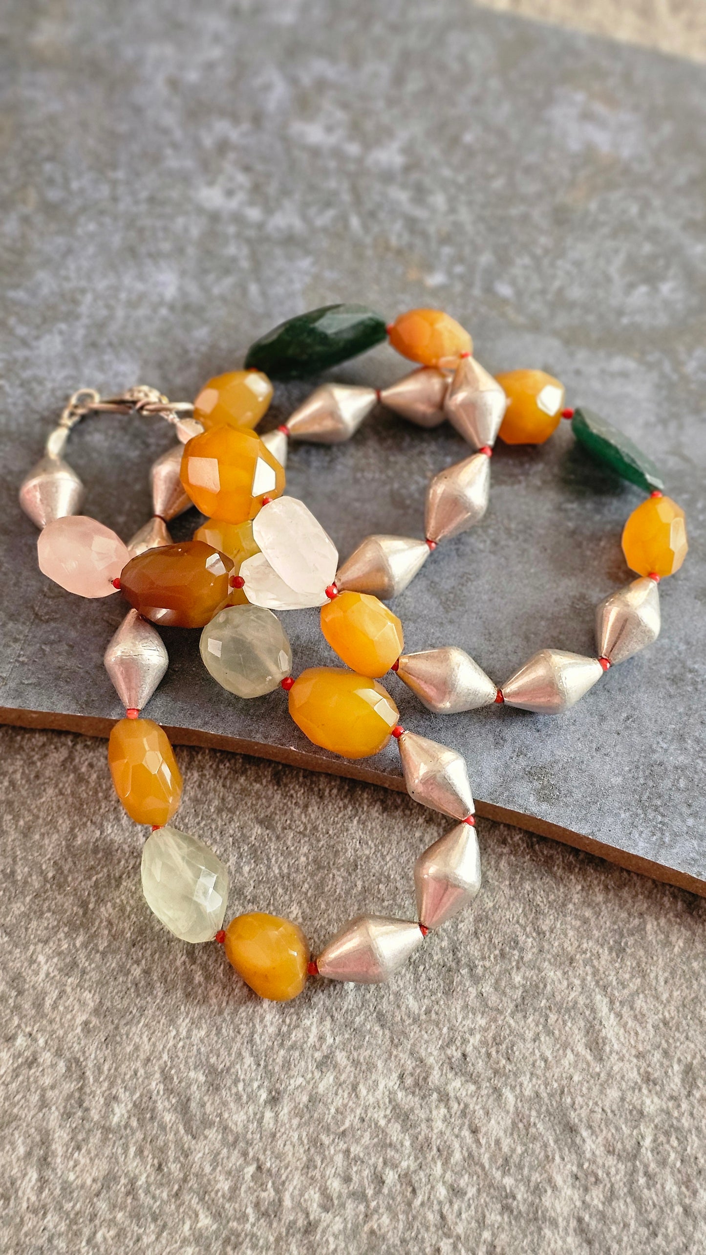 Mixed gemstones necklace with silver wax dholki beads