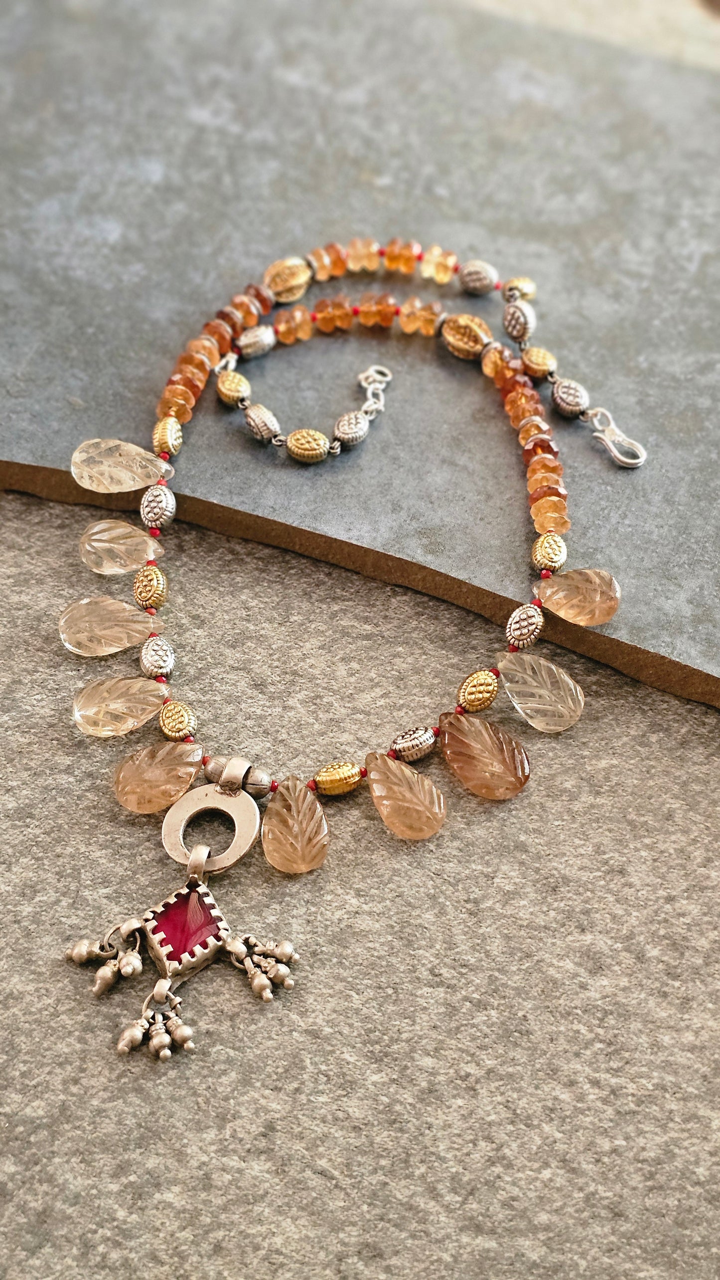 Carved champagne topaz necklace with vintage glass pendant