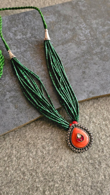 Malachite strings necklace with coral kundan pendant