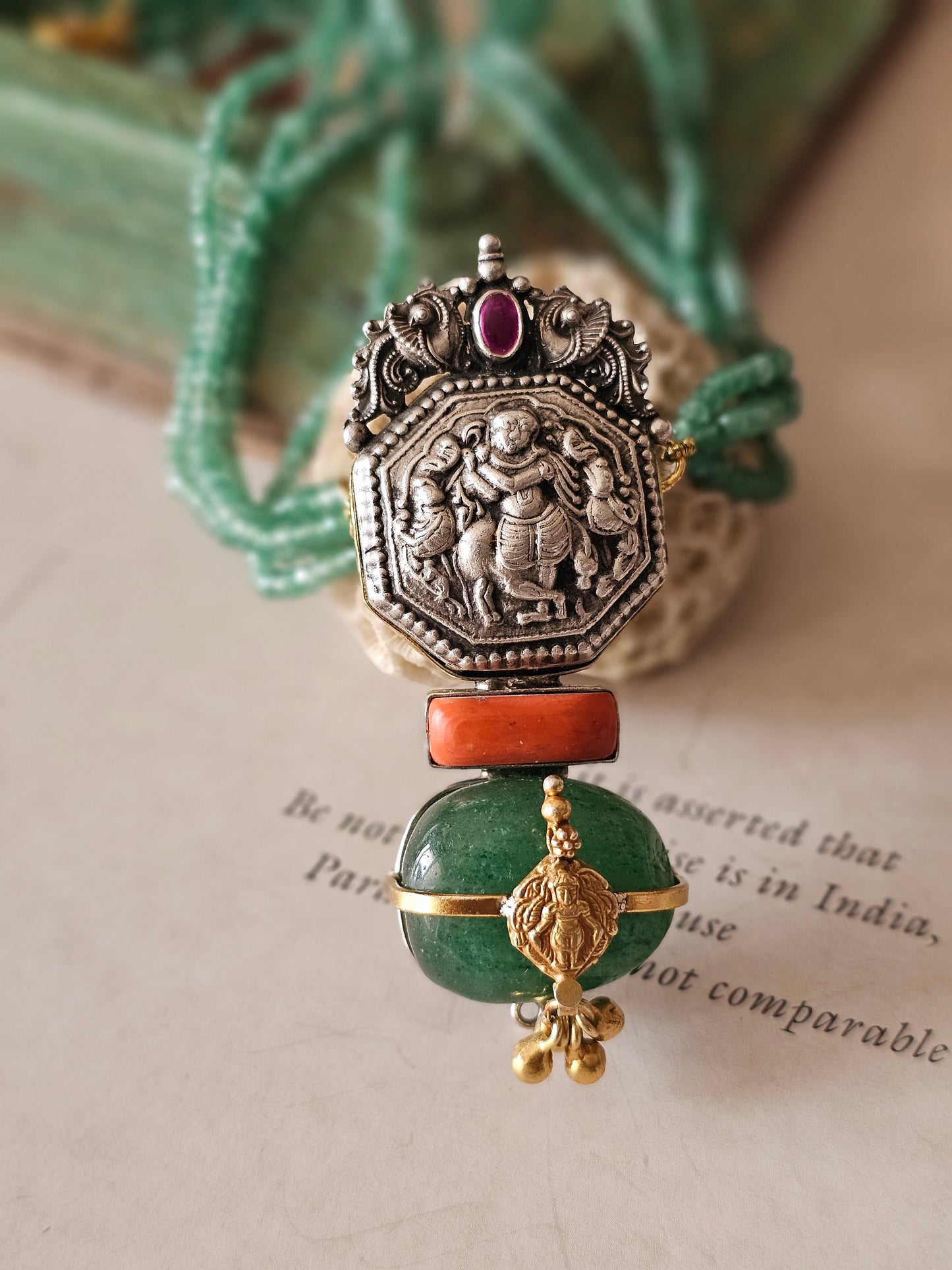 Vintage silver nakas pendant with emerald tumble and strings