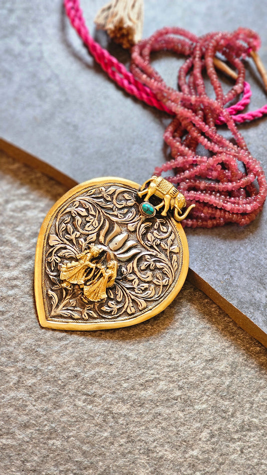 Real tourmaline necklace with repousse pendant