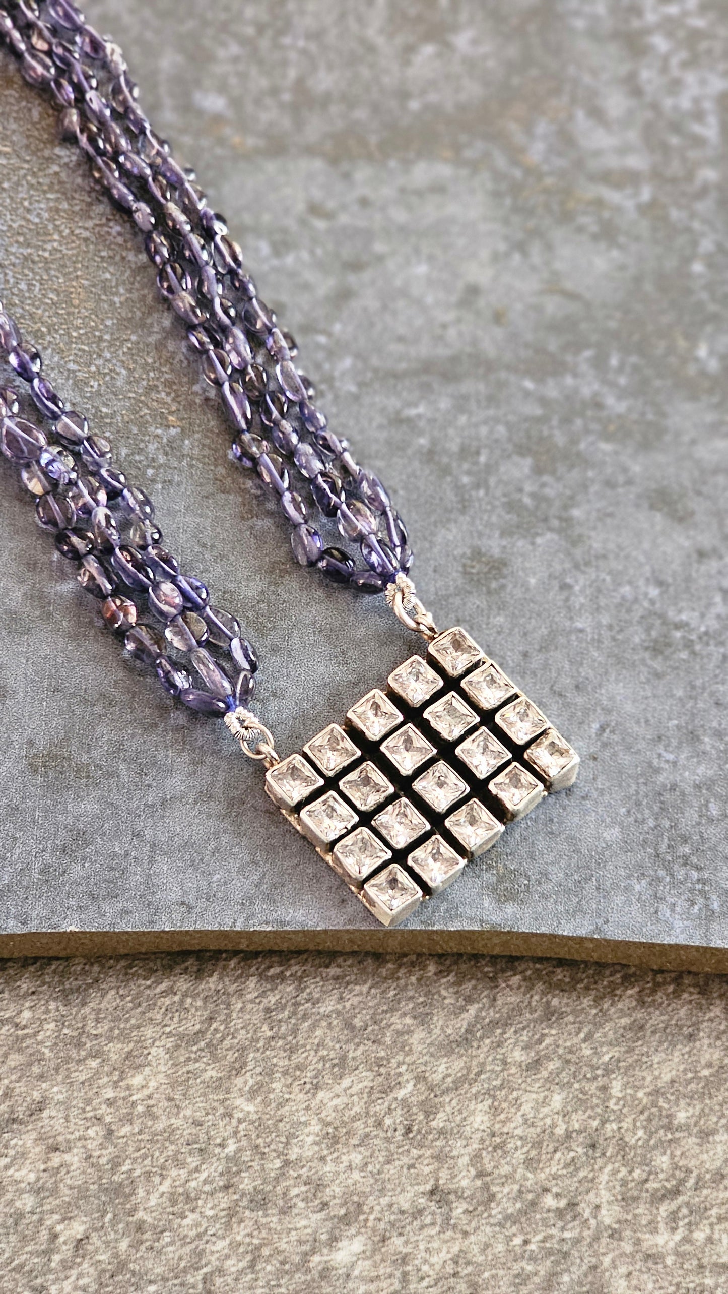 Iolite strings with a beautiful AD pendant