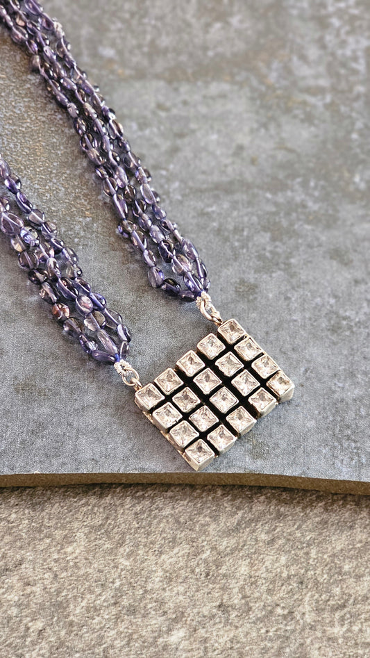 Iolite strings with a beautiful AD pendant