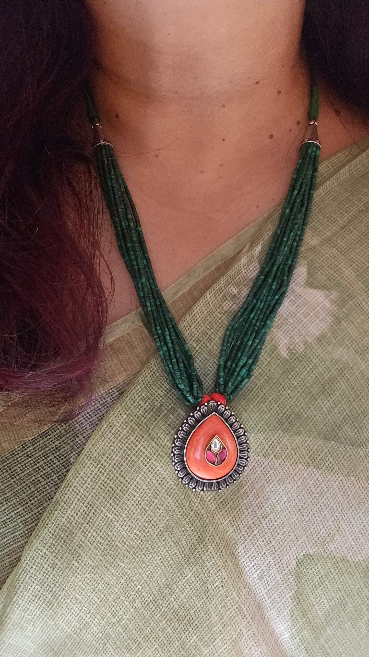 Malachite strings necklace with coral kundan pendant