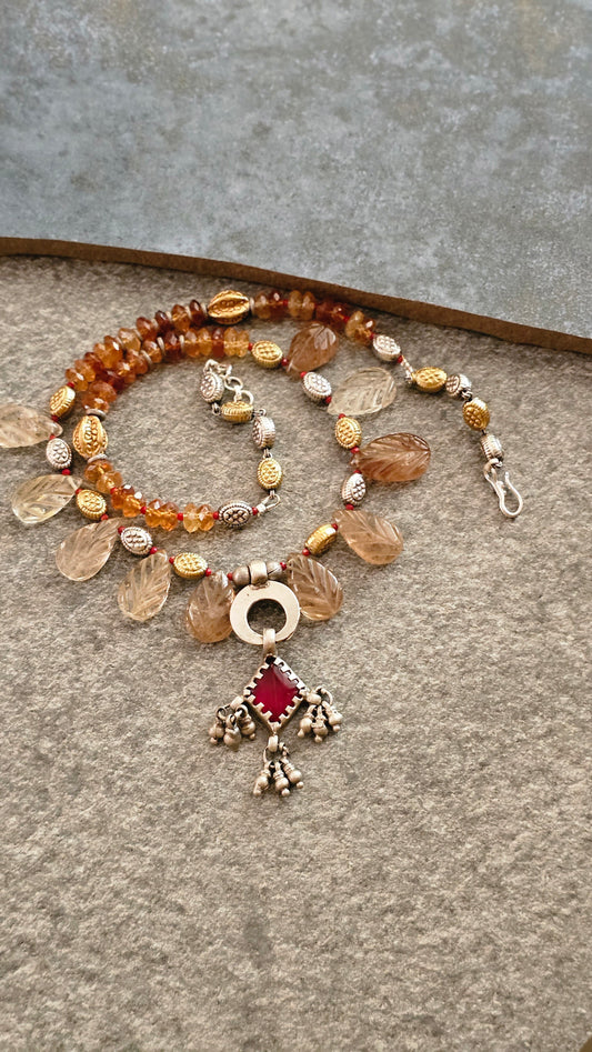 Carved champagne topaz necklace with vintage glass pendant